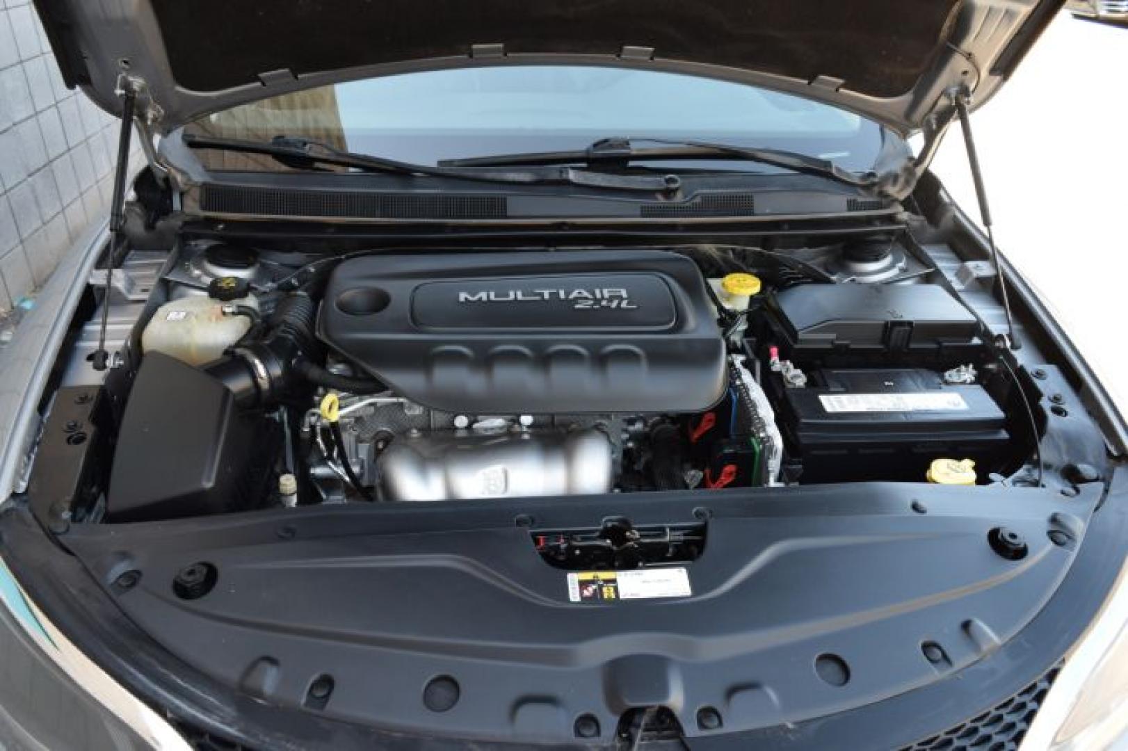 2016 Granite Crystal Metallic Clearcoat /Black Chrysler 200 C (1C3CCCCB4GN) with an 2.4L L4 DOHC 16V engine, 9-Speed Automatic transmission, located at 11056 N 23rd Dr #101, Phoenix, AZ, 85029, (623) 434-4252, 33.587704, -112.109962 - Photo#32