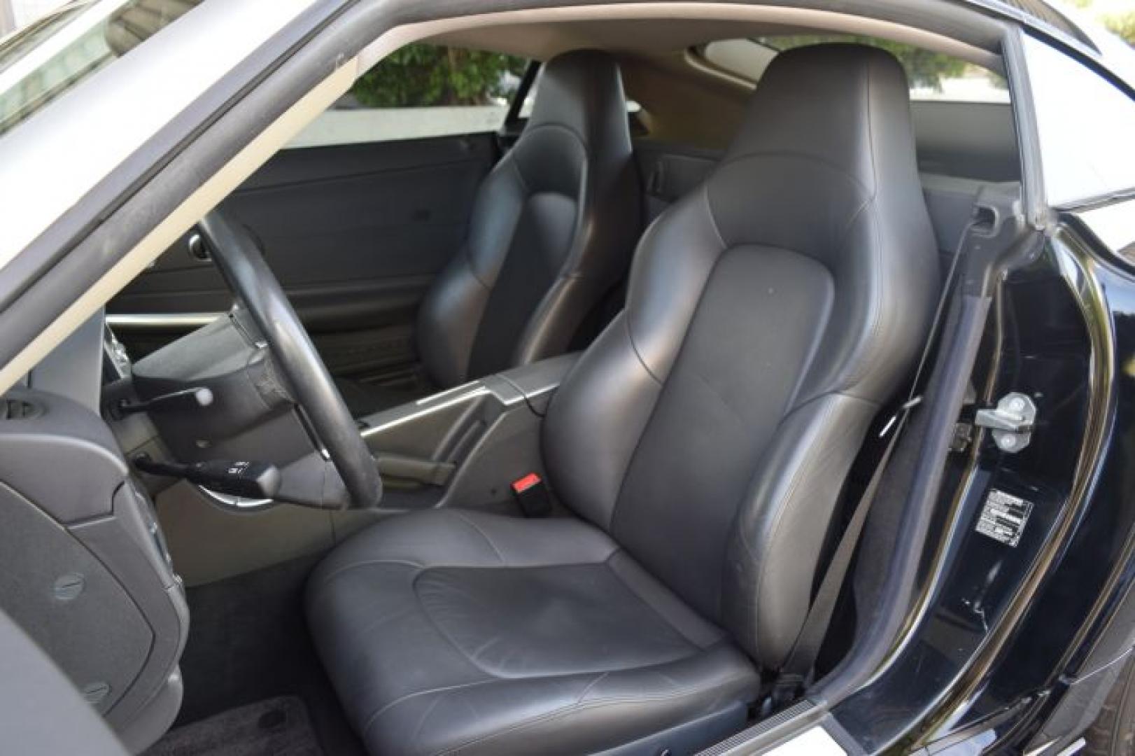 2004 Black /Dark Slate Gray Chrysler Crossfire Coupe (1C3AN69L74X) with an 3.2L V6 SOHC 18V engine, Automatic transmission, located at 11056 N 23rd Dr #101, Phoenix, AZ, 85029, (623) 434-4252, 33.587704, -112.109962 - Photo#9