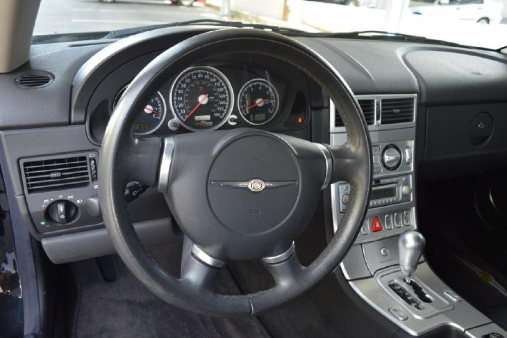 2004 Black /Dark Slate Gray Chrysler Crossfire Coupe (1C3AN69L74X) with an 3.2L V6 SOHC 18V engine, Automatic transmission, located at 11056 N 23rd Dr #101, Phoenix, AZ, 85029, (623) 434-4252, 33.587704, -112.109962 - Photo#11