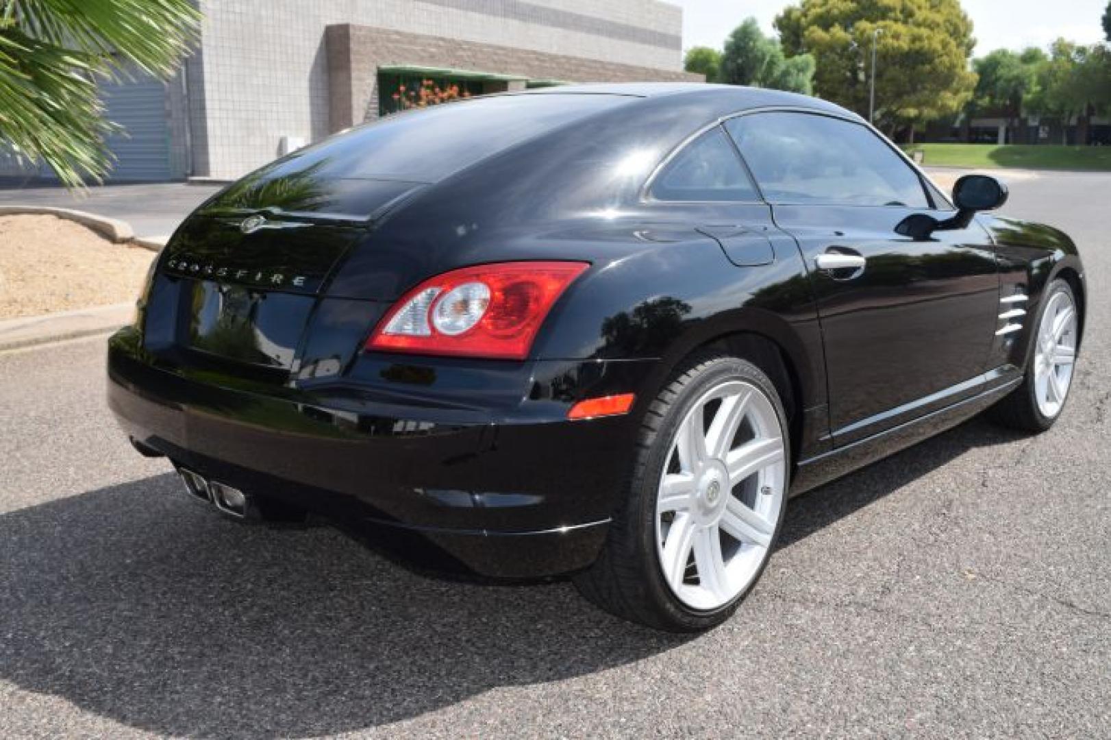 2004 Black /Dark Slate Gray Chrysler Crossfire Coupe (1C3AN69L74X) with an 3.2L V6 SOHC 18V engine, Automatic transmission, located at 11056 N 23rd Dr #101, Phoenix, AZ, 85029, (623) 434-4252, 33.587704, -112.109962 - Photo#5