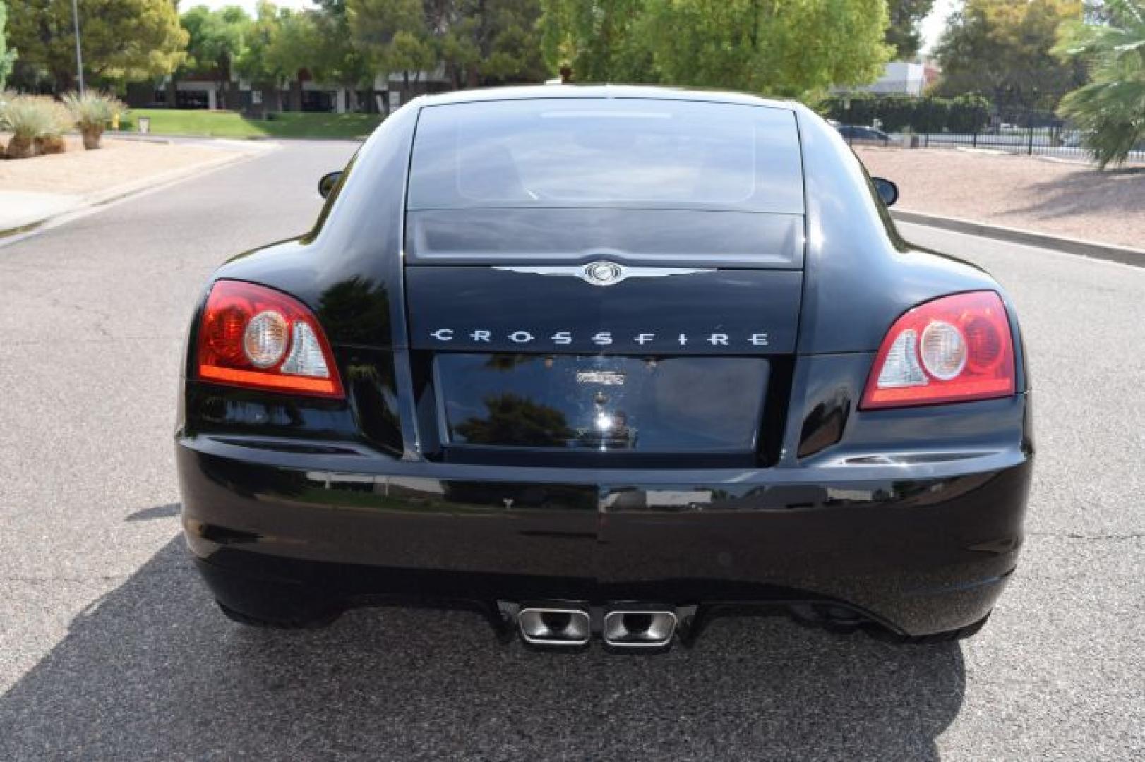 2004 Black /Dark Slate Gray Chrysler Crossfire Coupe (1C3AN69L74X) with an 3.2L V6 SOHC 18V engine, Automatic transmission, located at 11056 N 23rd Dr #101, Phoenix, AZ, 85029, (623) 434-4252, 33.587704, -112.109962 - Photo#7