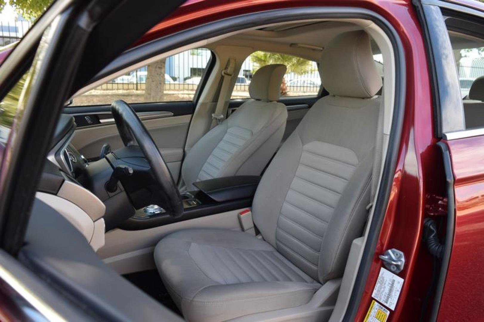 2017 Ruby Red Metallic Tinted Clearcoat /Medium Light Stone Ford Fusion Hybrid SE (3FA6P0LU2HR) with an 2.0L L4 DOHC 16V HYBRID engine, CVT transmission, located at 11056 N 23rd Dr #101, Phoenix, AZ, 85029, (623) 434-4252, 33.587704, -112.109962 - Photo#10