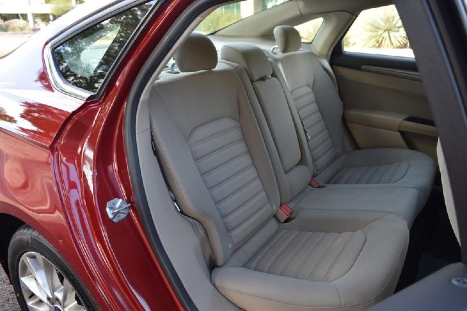 2017 Ruby Red Metallic Tinted Clearcoat /Medium Light Stone Ford Fusion Hybrid SE (3FA6P0LU2HR) with an 2.0L L4 DOHC 16V HYBRID engine, CVT transmission, located at 11056 N 23rd Dr #101, Phoenix, AZ, 85029, (623) 434-4252, 33.587704, -112.109962 - Photo#13