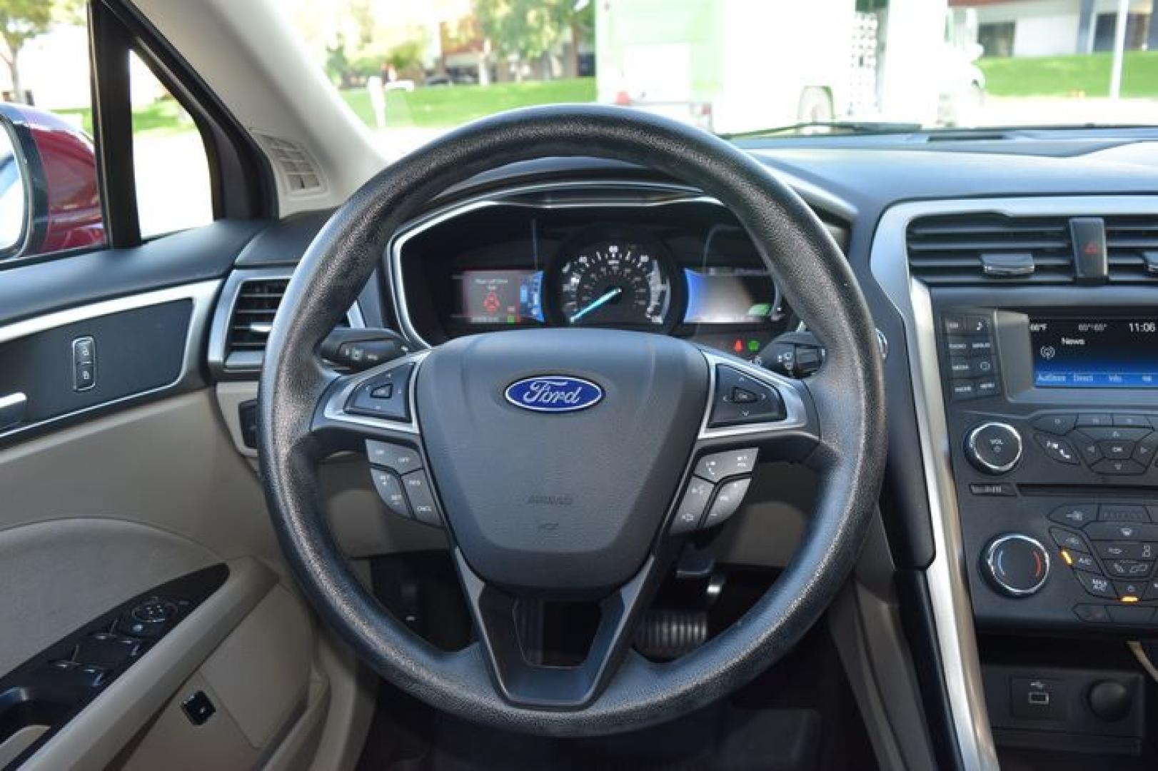 2017 Ruby Red Metallic Tinted Clearcoat /Medium Light Stone Ford Fusion Hybrid SE (3FA6P0LU2HR) with an 2.0L L4 DOHC 16V HYBRID engine, CVT transmission, located at 11056 N 23rd Dr #101, Phoenix, AZ, 85029, (623) 434-4252, 33.587704, -112.109962 - Photo#14