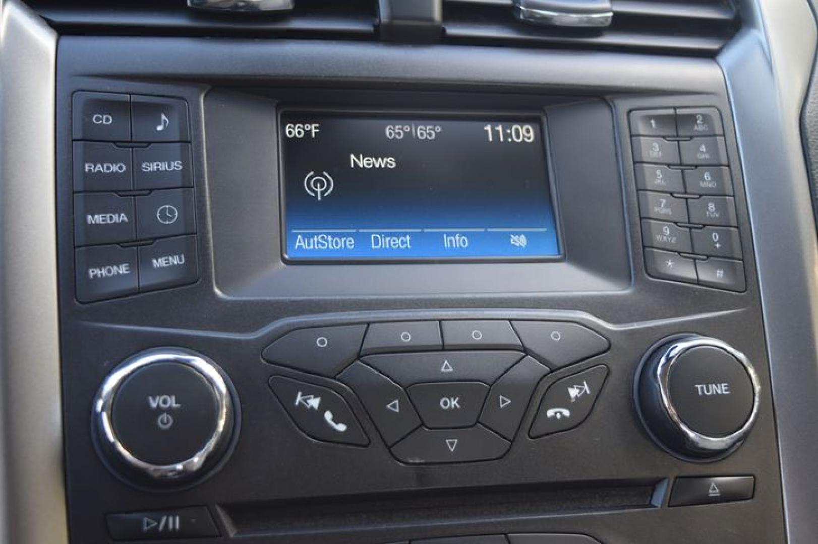 2017 Ruby Red Metallic Tinted Clearcoat /Medium Light Stone Ford Fusion Hybrid SE (3FA6P0LU2HR) with an 2.0L L4 DOHC 16V HYBRID engine, CVT transmission, located at 11056 N 23rd Dr #101, Phoenix, AZ, 85029, (623) 434-4252, 33.587704, -112.109962 - Photo#18