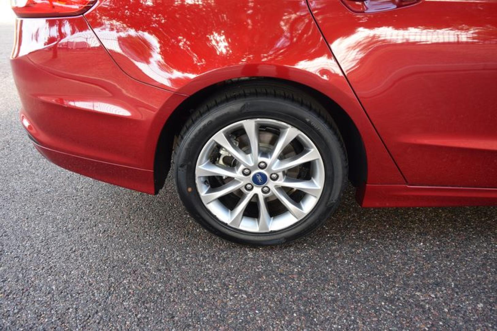 2017 Ruby Red Metallic Tinted Clearcoat /Medium Light Stone Ford Fusion Hybrid SE (3FA6P0LU2HR) with an 2.0L L4 DOHC 16V HYBRID engine, CVT transmission, located at 11056 N 23rd Dr #101, Phoenix, AZ, 85029, (623) 434-4252, 33.587704, -112.109962 - Photo#35