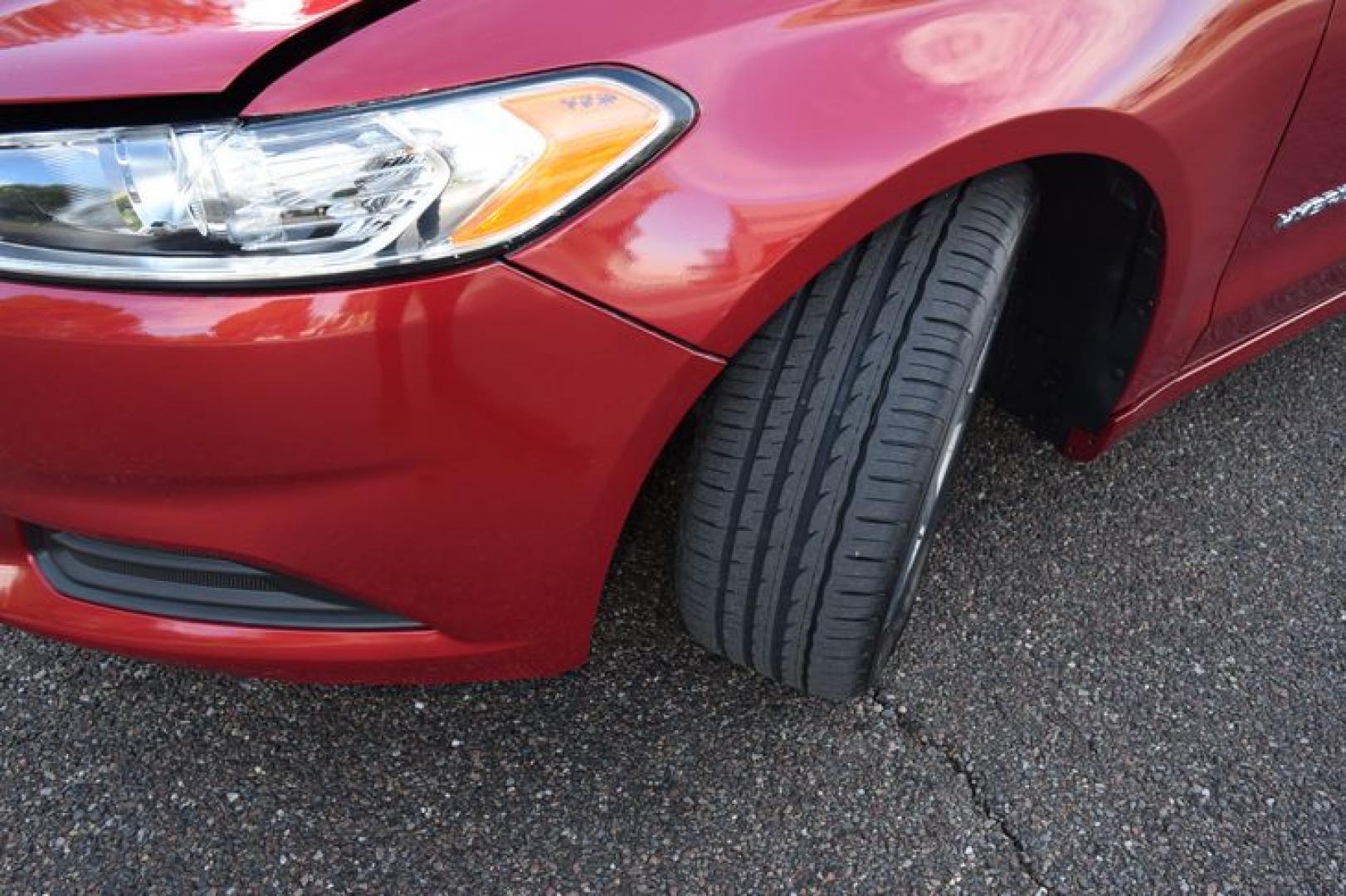 2017 Ruby Red Metallic Tinted Clearcoat /Medium Light Stone Ford Fusion Hybrid SE (3FA6P0LU2HR) with an 2.0L L4 DOHC 16V HYBRID engine, CVT transmission, located at 11056 N 23rd Dr #101, Phoenix, AZ, 85029, (623) 434-4252, 33.587704, -112.109962 - Photo#36