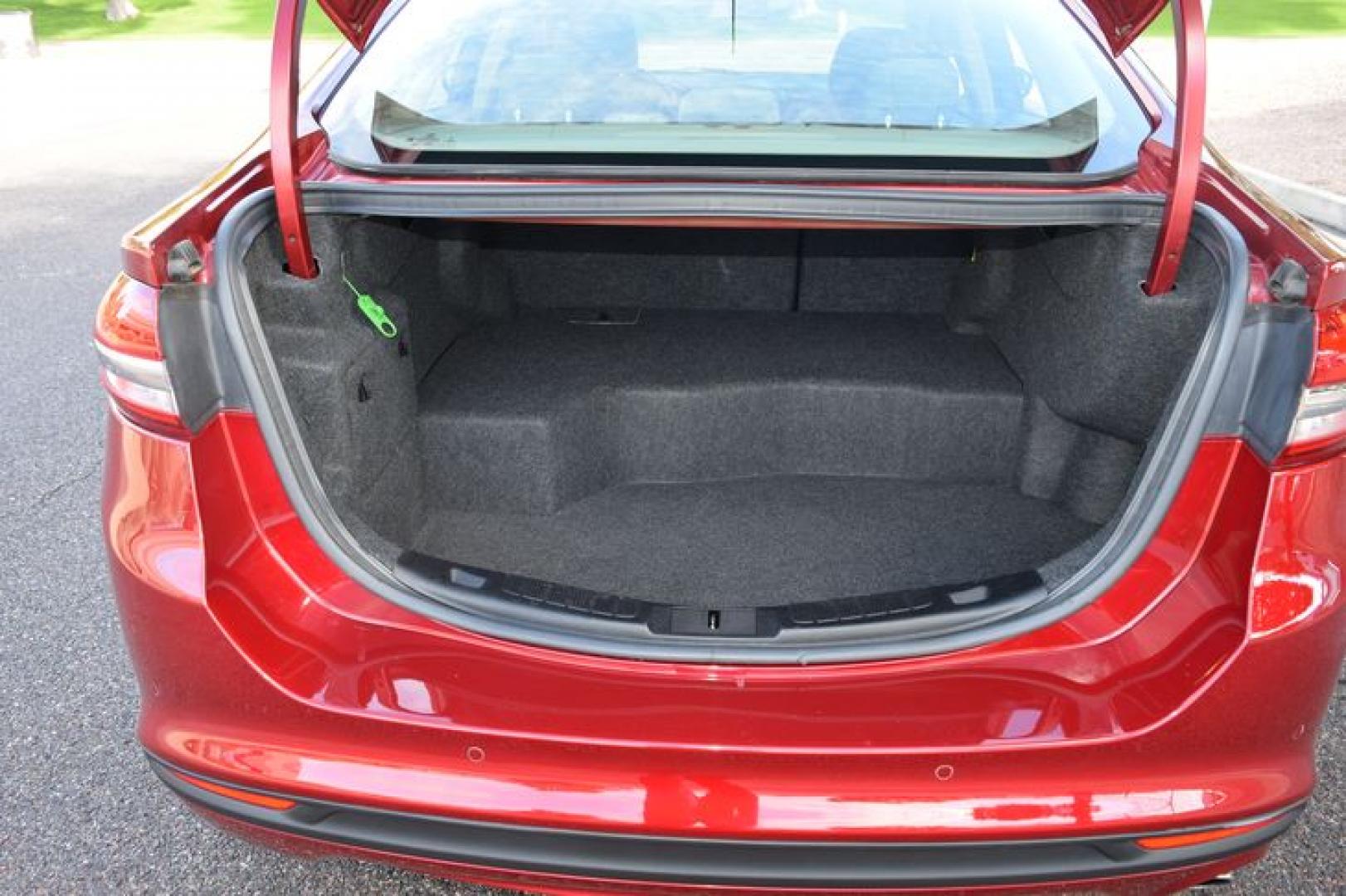 2017 Ruby Red Metallic Tinted Clearcoat /Medium Light Stone Ford Fusion Hybrid SE (3FA6P0LU2HR) with an 2.0L L4 DOHC 16V HYBRID engine, CVT transmission, located at 11056 N 23rd Dr #101, Phoenix, AZ, 85029, (623) 434-4252, 33.587704, -112.109962 - Photo#37