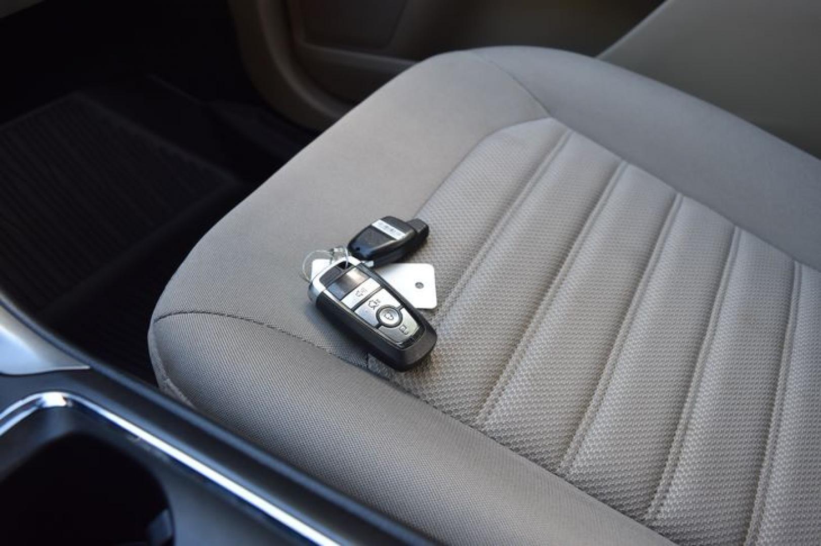 2017 Ruby Red Metallic Tinted Clearcoat /Medium Light Stone Ford Fusion Hybrid SE (3FA6P0LU2HR) with an 2.0L L4 DOHC 16V HYBRID engine, CVT transmission, located at 11056 N 23rd Dr #101, Phoenix, AZ, 85029, (623) 434-4252, 33.587704, -112.109962 - Photo#41