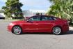 2017 Ruby Red Metallic Tinted Clearcoat /Medium Light Stone Ford Fusion Hybrid SE (3FA6P0LU2HR) with an 2.0L L4 DOHC 16V HYBRID engine, CVT transmission, located at 11056 N 23rd Dr #101, Phoenix, AZ, 85029, (623) 434-4252, 33.587704, -112.109962 - Photo#4