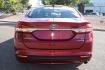 2017 Ruby Red Metallic Tinted Clearcoat /Medium Light Stone Ford Fusion Hybrid SE (3FA6P0LU2HR) with an 2.0L L4 DOHC 16V HYBRID engine, CVT transmission, located at 11056 N 23rd Dr #101, Phoenix, AZ, 85029, (623) 434-4252, 33.587704, -112.109962 - Photo#7