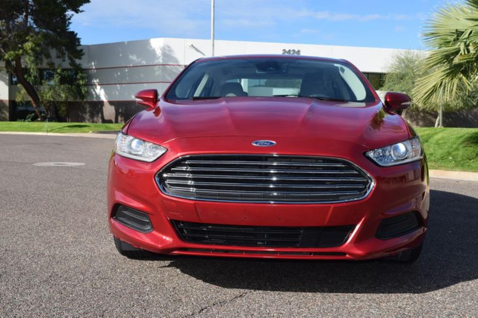 2017 Ruby Red Metallic Tinted Clearcoat /Medium Light Stone Ford Fusion Hybrid SE (3FA6P0LU2HR) with an 2.0L L4 DOHC 16V HYBRID engine, CVT transmission, located at 11056 N 23rd Dr #101, Phoenix, AZ, 85029, (623) 434-4252, 33.587704, -112.109962 - Photo#8