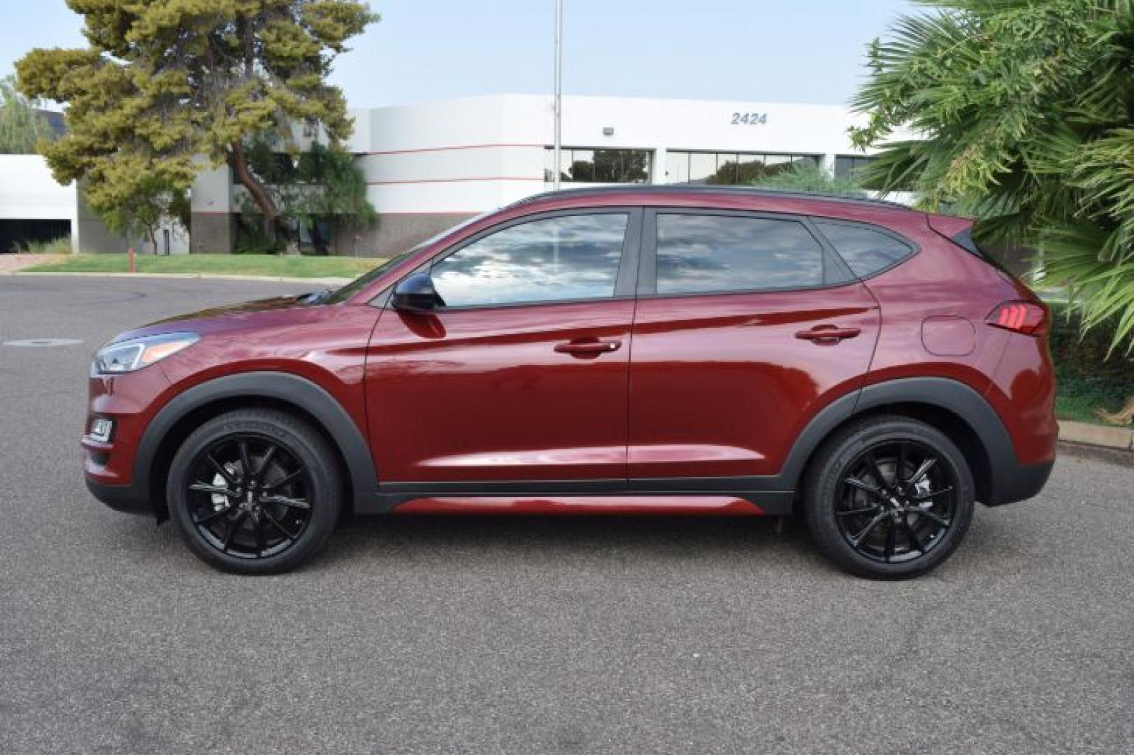 2019 Gemstone Red /Black Hyundai Tucson Sport (KM8J33ALXKU) with an 2.4L L4 DOHC 16V engine, 6-Speed Automatic transmission, located at 11056 N 23rd Dr #101, Phoenix, AZ, 85029, (623) 434-4252, 33.587704, -112.109962 - Photo#4