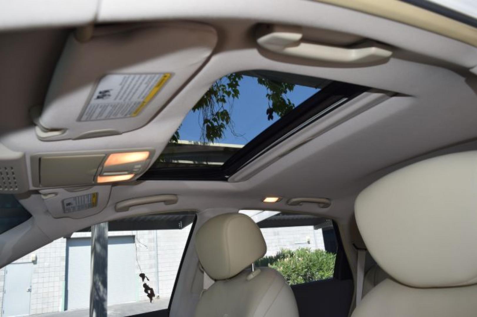 2008 Moonlight White Pearl /Wheat Infiniti EX EX35 (JNKAJ09E58M) with an 3.5L V6 DOHC 24V engine, 5-Speed Automatic Overdrive transmission, located at 11056 N 23rd Dr #101, Phoenix, AZ, 85029, (623) 434-4252, 33.587704, -112.109962 - Photo#9