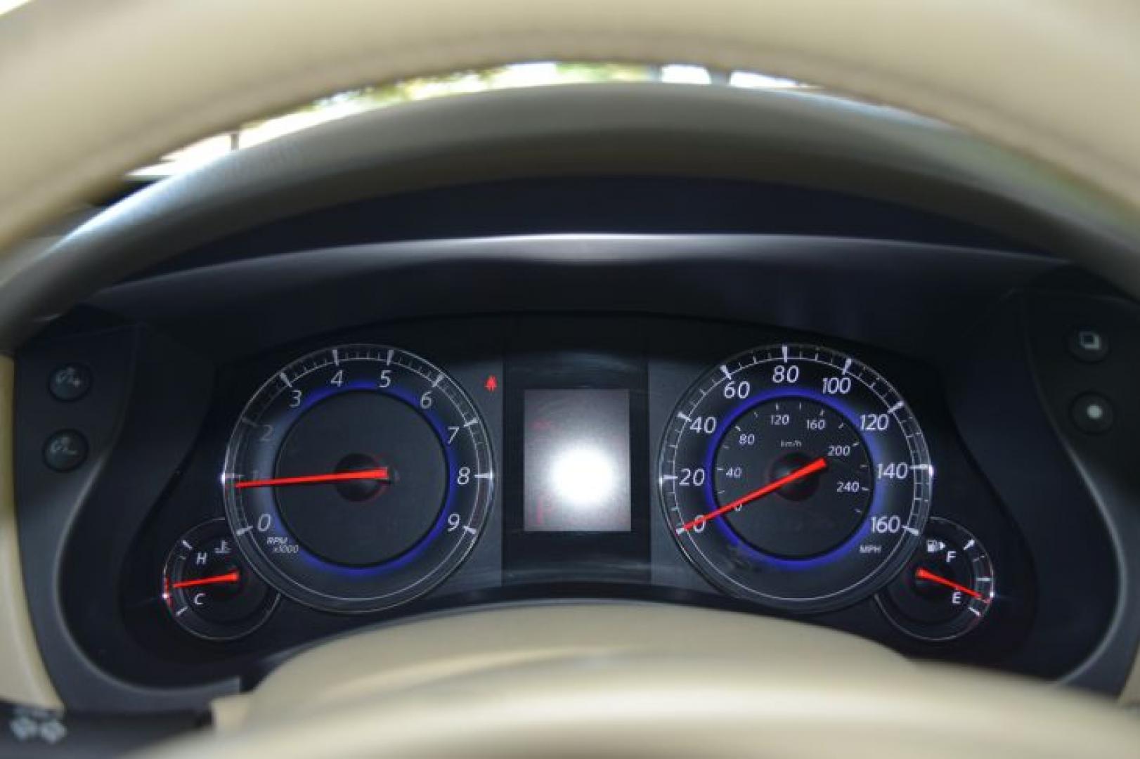 2008 Moonlight White Pearl /Wheat Infiniti EX EX35 (JNKAJ09E58M) with an 3.5L V6 DOHC 24V engine, 5-Speed Automatic Overdrive transmission, located at 11056 N 23rd Dr #101, Phoenix, AZ, 85029, (623) 434-4252, 33.587704, -112.109962 - Photo#15