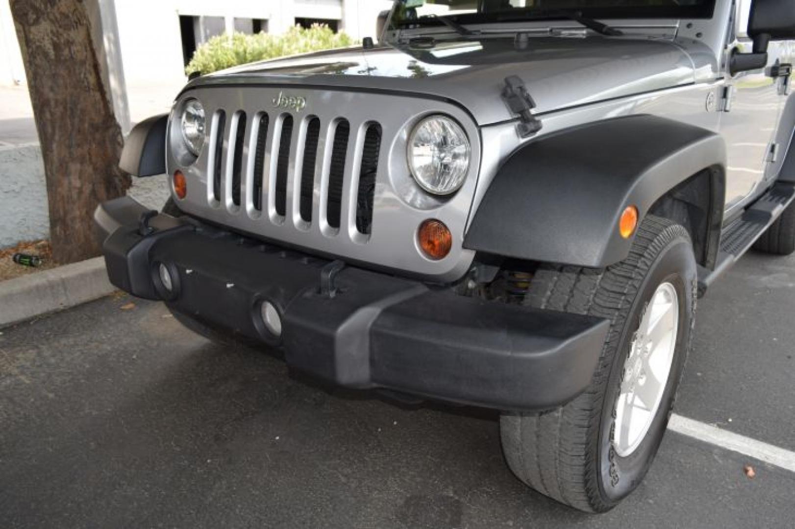 2013 Billet Silver Metallic /Black Jeep Wrangler Unlimited Sport 4WD (1C4BJWDG0DL) with an 3.6L V6 DOHC 24V FFV engine, Automatic transmission, located at 11056 N 23rd Dr #101, Phoenix, AZ, 85029, (623) 434-4252, 33.587704, -112.109962 - Photo#26