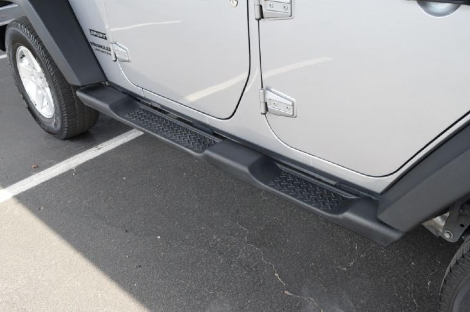 2013 Billet Silver Metallic /Black Jeep Wrangler Unlimited Sport 4WD (1C4BJWDG0DL) with an 3.6L V6 DOHC 24V FFV engine, Automatic transmission, located at 11056 N 23rd Dr #101, Phoenix, AZ, 85029, (623) 434-4252, 33.587704, -112.109962 - Photo#27