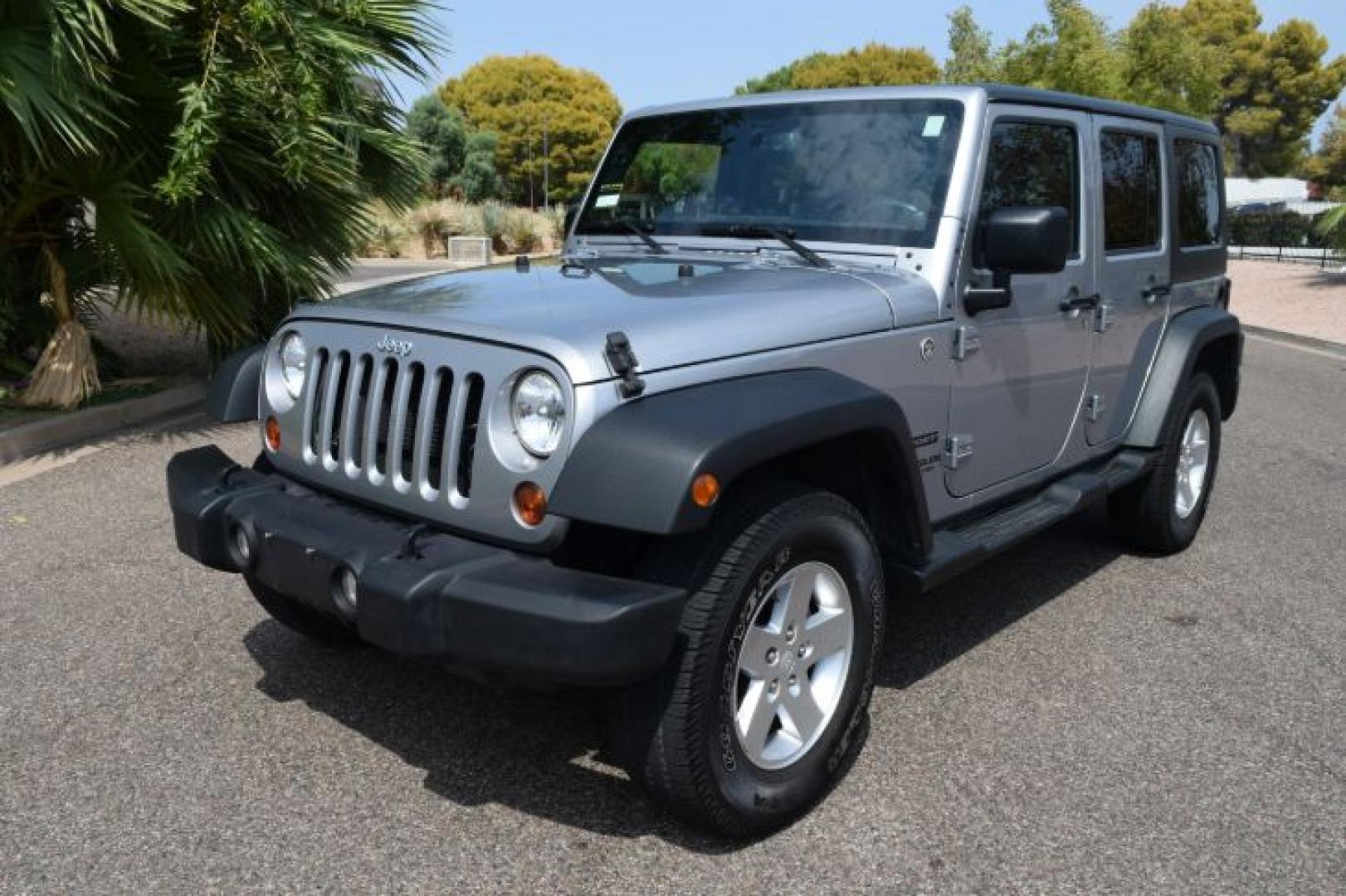 2013 Billet Silver Metallic /Black Jeep Wrangler Unlimited Sport 4WD (1C4BJWDG0DL) with an 3.6L V6 DOHC 24V FFV engine, Automatic transmission, located at 11056 N 23rd Dr #101, Phoenix, AZ, 85029, (623) 434-4252, 33.587704, -112.109962 - Photo#2