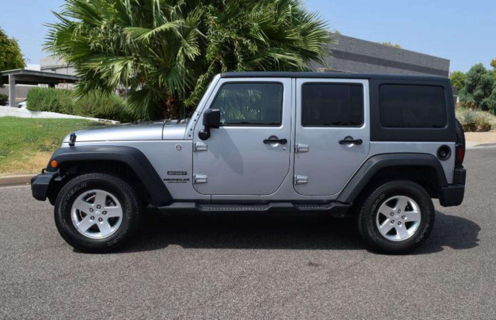 2013 Billet Silver Metallic /Black Jeep Wrangler Unlimited Sport 4WD (1C4BJWDG0DL) with an 3.6L V6 DOHC 24V FFV engine, Automatic transmission, located at 11056 N 23rd Dr #101, Phoenix, AZ, 85029, (623) 434-4252, 33.587704, -112.109962 - Photo#4