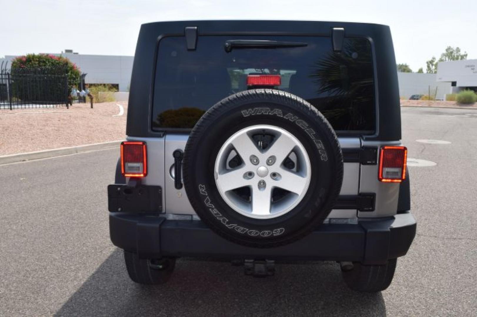 2013 Billet Silver Metallic /Black Jeep Wrangler Unlimited Sport 4WD (1C4BJWDG0DL) with an 3.6L V6 DOHC 24V FFV engine, Automatic transmission, located at 11056 N 23rd Dr #101, Phoenix, AZ, 85029, (623) 434-4252, 33.587704, -112.109962 - Photo#7