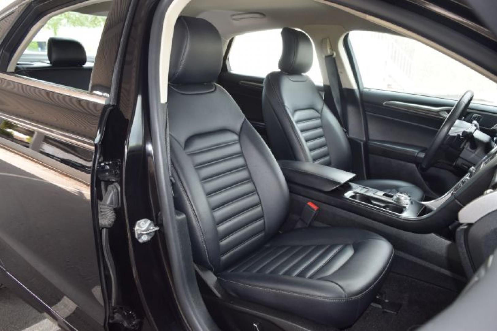 2019 Agate Black /Ebony Ford Fusion SEL (3FA6P0CD3KR) with an 1.5L L4 DOHC 16V engine, 6A transmission, located at 11056 N 23rd Dr #101, Phoenix, AZ, 85029, (623) 434-4252, 33.587704, -112.109962 - Photo#11