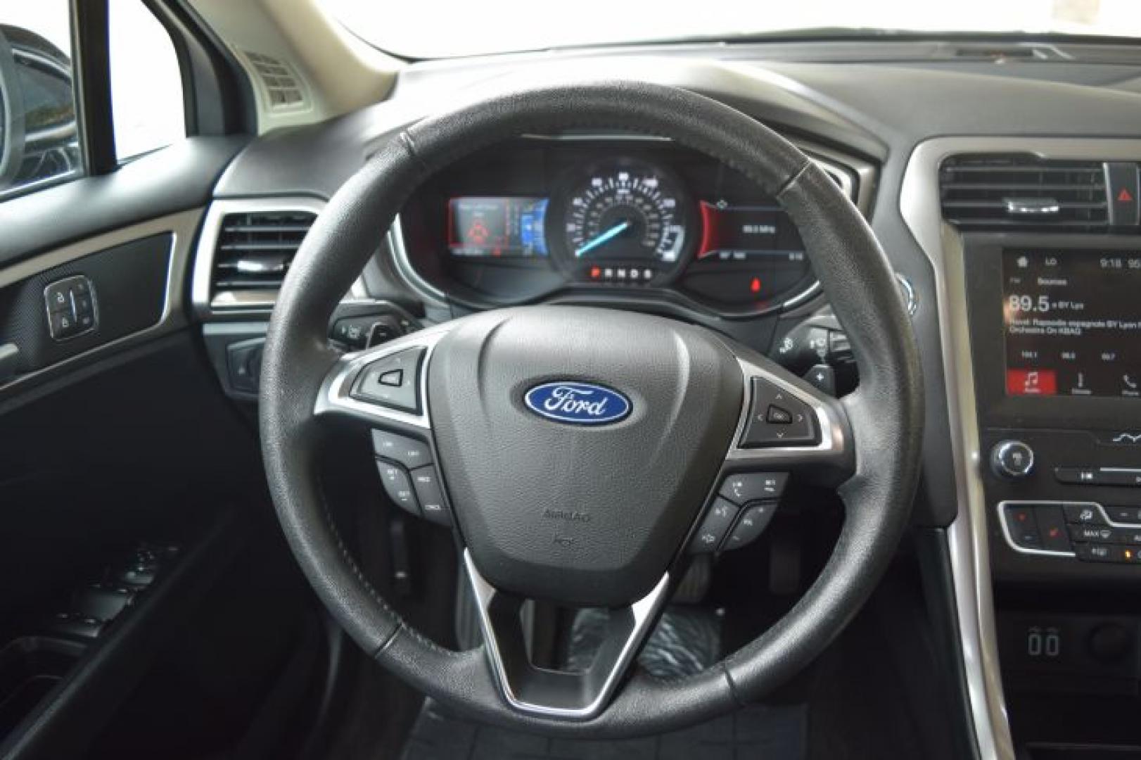 2019 Agate Black /Ebony Ford Fusion SEL (3FA6P0CD3KR) with an 1.5L L4 DOHC 16V engine, 6A transmission, located at 11056 N 23rd Dr #101, Phoenix, AZ, 85029, (623) 434-4252, 33.587704, -112.109962 - Photo#13