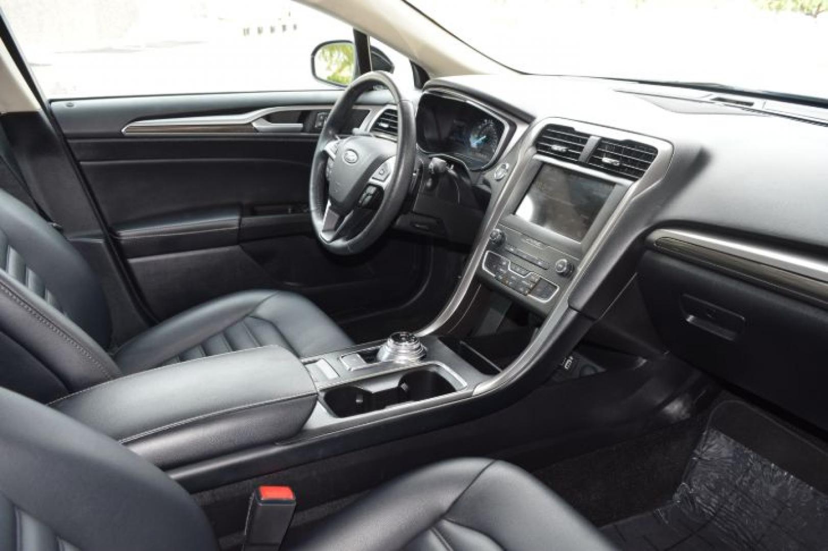 2019 Agate Black /Ebony Ford Fusion SEL (3FA6P0CD3KR) with an 1.5L L4 DOHC 16V engine, 6A transmission, located at 11056 N 23rd Dr #101, Phoenix, AZ, 85029, (623) 434-4252, 33.587704, -112.109962 - Photo#1