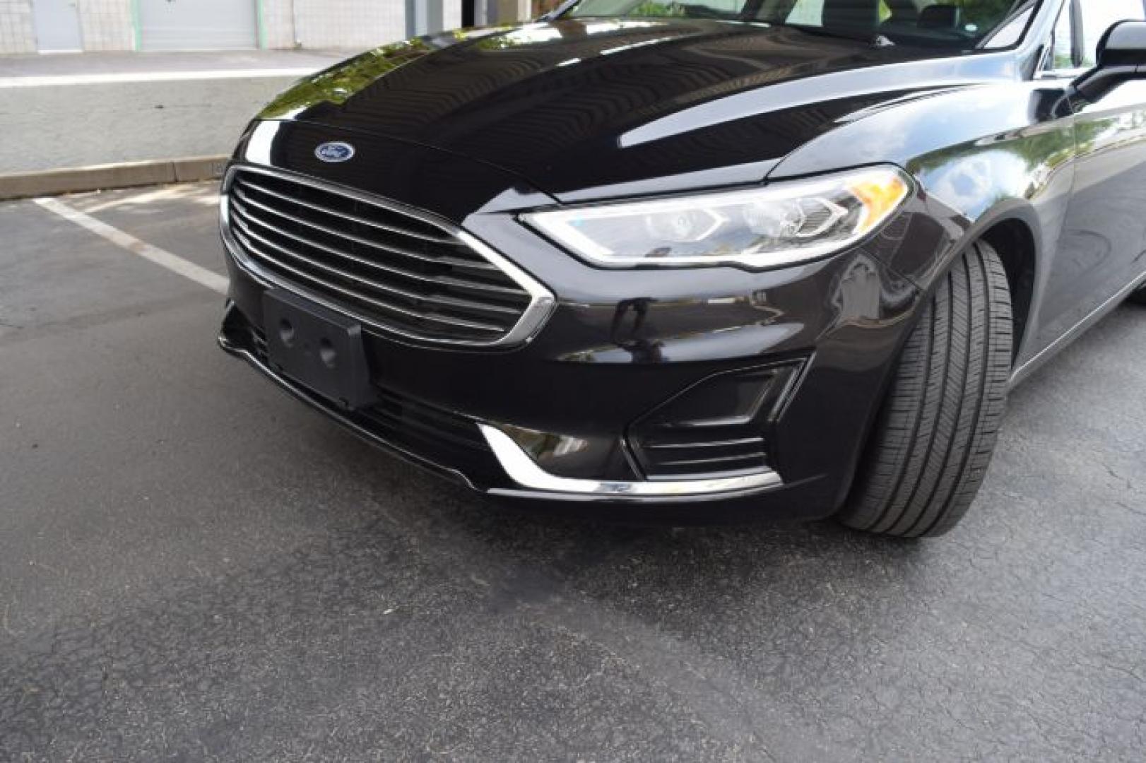 2019 Agate Black /Ebony Ford Fusion SEL (3FA6P0CD3KR) with an 1.5L L4 DOHC 16V engine, 6A transmission, located at 11056 N 23rd Dr #101, Phoenix, AZ, 85029, (623) 434-4252, 33.587704, -112.109962 - Photo#30