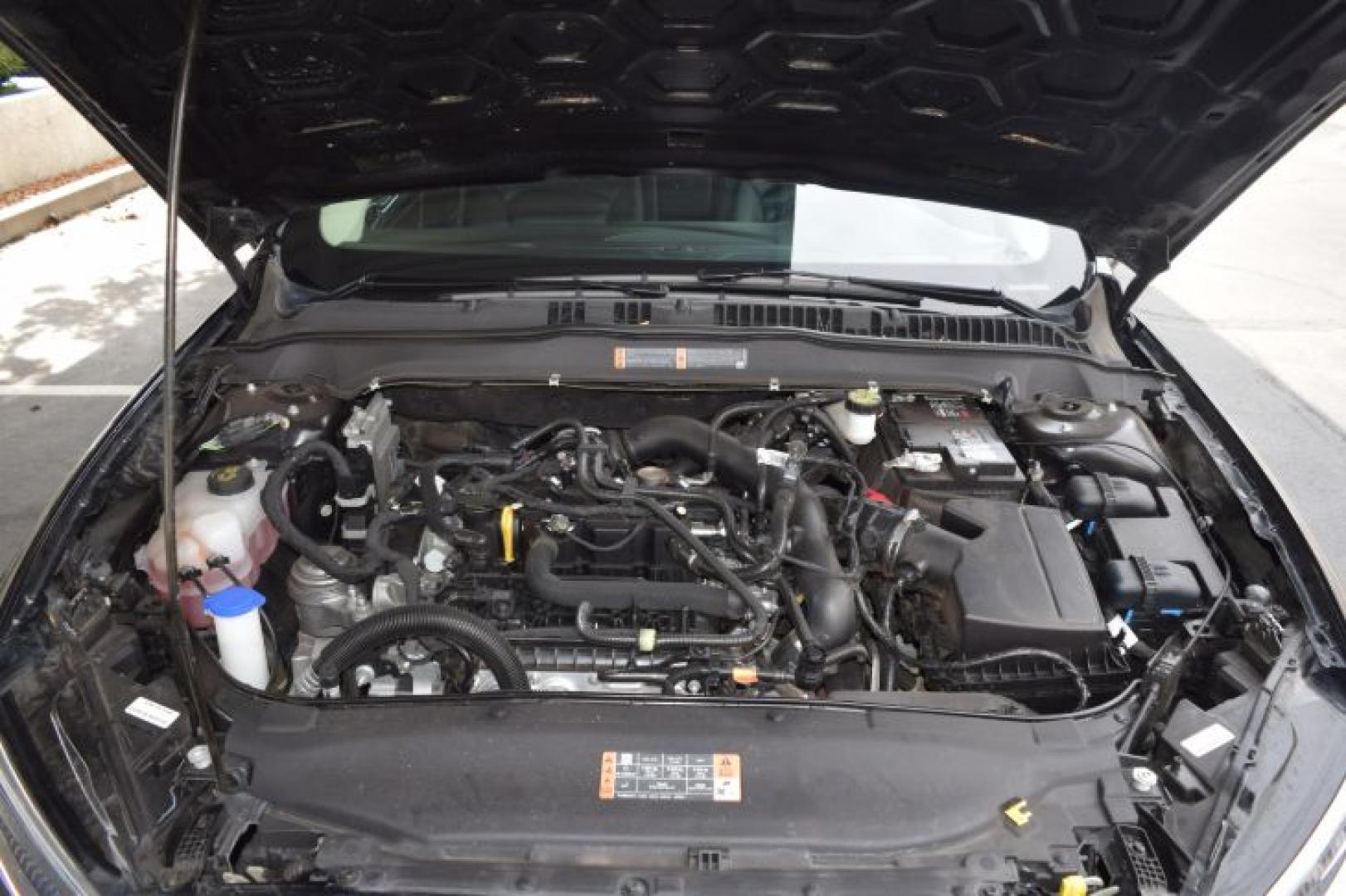 2019 Agate Black /Ebony Ford Fusion SEL (3FA6P0CD3KR) with an 1.5L L4 DOHC 16V engine, 6A transmission, located at 11056 N 23rd Dr #101, Phoenix, AZ, 85029, (623) 434-4252, 33.587704, -112.109962 - Photo#33