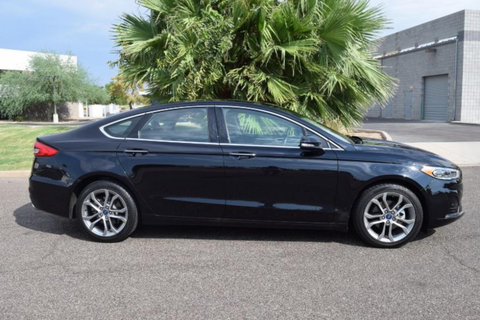 2019 Agate Black /Ebony Ford Fusion SEL (3FA6P0CD3KR) with an 1.5L L4 DOHC 16V engine, 6A transmission, located at 11056 N 23rd Dr #101, Phoenix, AZ, 85029, (623) 434-4252, 33.587704, -112.109962 - Photo#3