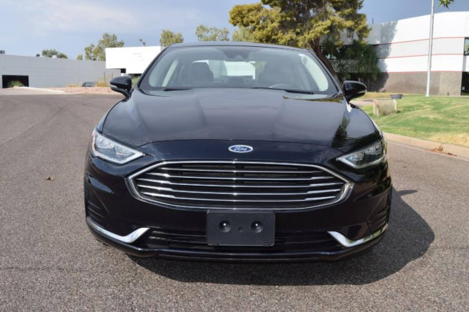 2019 Agate Black /Ebony Ford Fusion SEL (3FA6P0CD3KR) with an 1.5L L4 DOHC 16V engine, 6A transmission, located at 11056 N 23rd Dr #101, Phoenix, AZ, 85029, (623) 434-4252, 33.587704, -112.109962 - Photo#8
