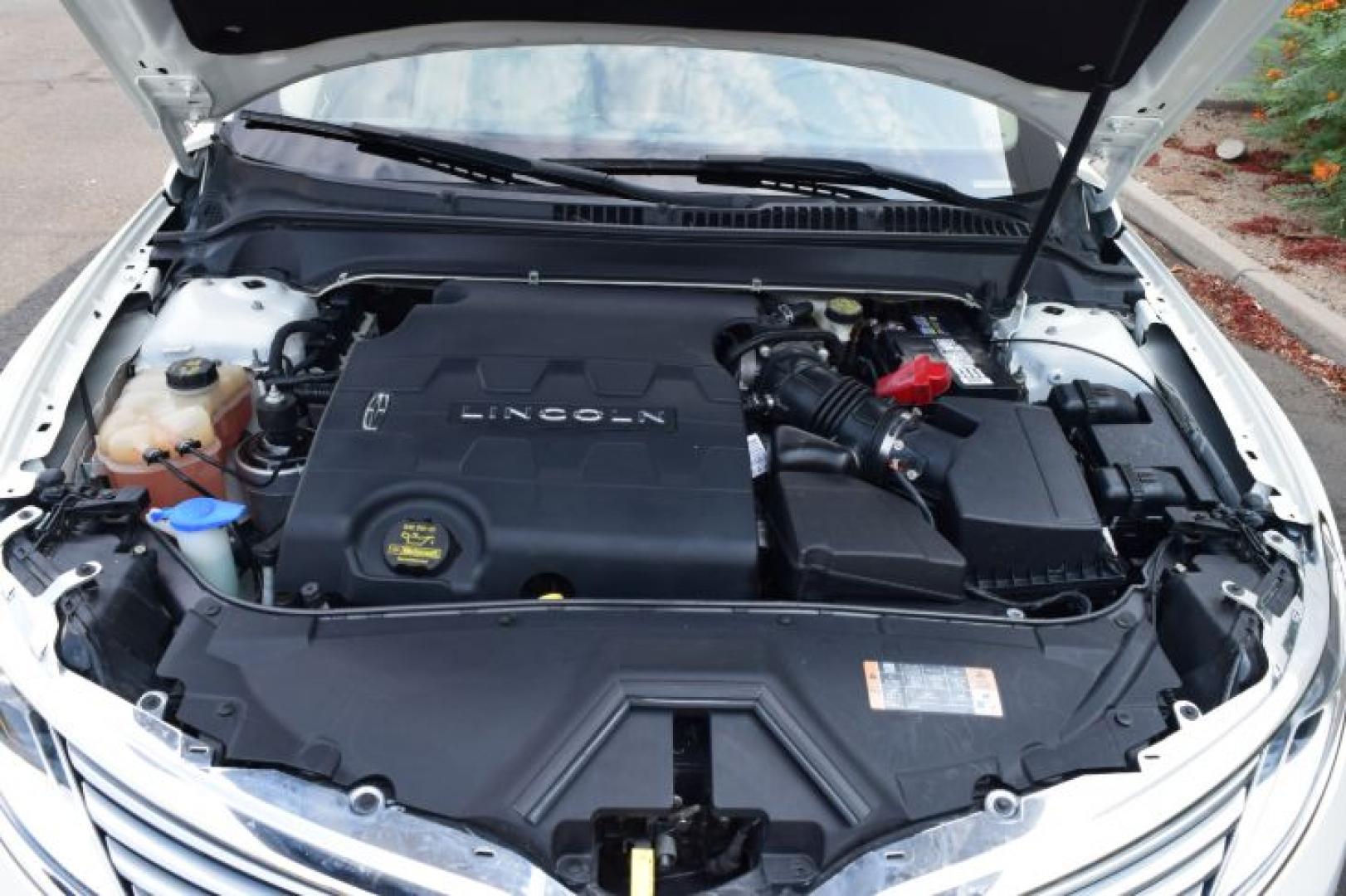 2013 White Platinum Metallic Tri-Coat /Light Dune Lincoln MKZ FWD (3LN6L2GK4DR) with an 3.7L V6 DOHC 24V engine, 6-Speed Automatic transmission, located at 11056 N 23rd Dr #101, Phoenix, AZ, 85029, (623) 434-4252, 33.587704, -112.109962 - Photo#37