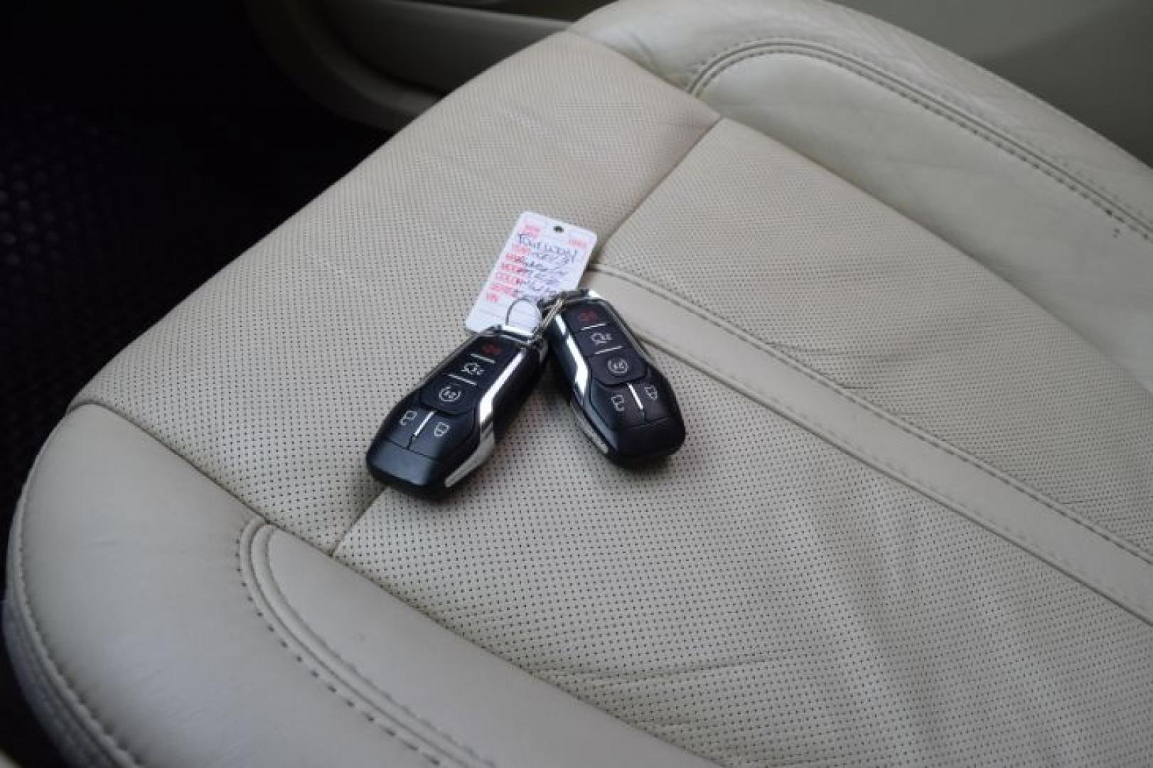 2013 White Platinum Metallic Tri-Coat /Light Dune Lincoln MKZ FWD (3LN6L2GK4DR) with an 3.7L V6 DOHC 24V engine, 6-Speed Automatic transmission, located at 11056 N 23rd Dr #101, Phoenix, AZ, 85029, (623) 434-4252, 33.587704, -112.109962 - Photo#42