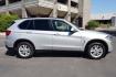 2015 Mineral Silver Metallic /Black BMW X5 sDrive35i (5UXKR2C58F0) with an 3.0L L6 DOHC 24V engine, 8-Speed Automatic transmission, located at 11056 N 23rd Dr #101, Phoenix, AZ, 85029, (623) 434-4252, 33.587704, -112.109962 - Photo#3