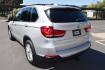 2015 Mineral Silver Metallic /Black BMW X5 sDrive35i (5UXKR2C58F0) with an 3.0L L6 DOHC 24V engine, 8-Speed Automatic transmission, located at 11056 N 23rd Dr #101, Phoenix, AZ, 85029, (623) 434-4252, 33.587704, -112.109962 - Photo#6